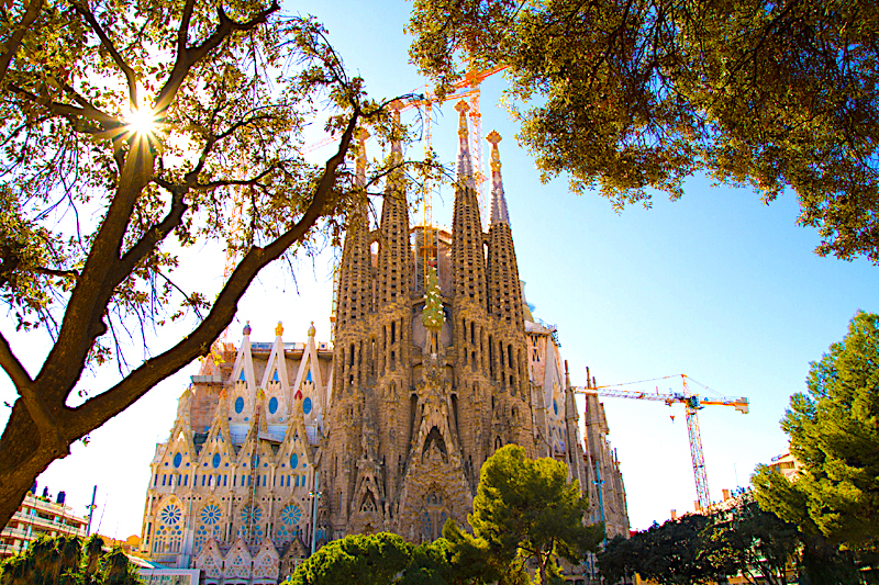 The Art Nouveau spires of La Sagrada Familia rise over Barcelona